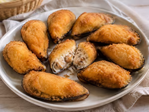 Spanish stuffed mussels served with a natural homemade finish
