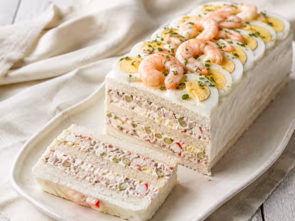 Chilled tuna, egg and prawn sandwich loaf served with a natural homemade finish