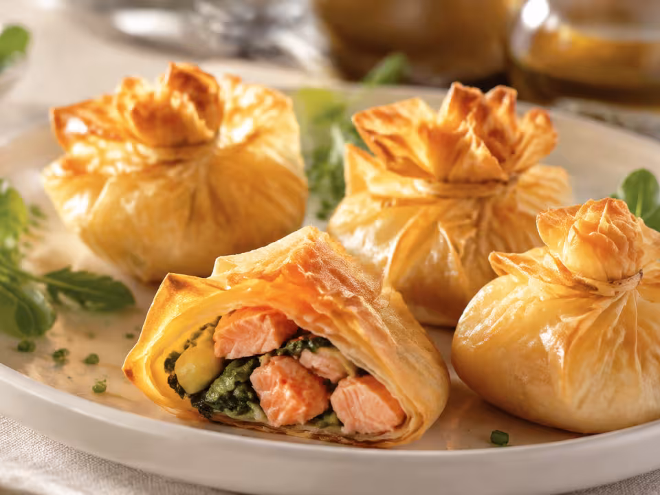 Air-fryer salmon filo parcels plated and ready to eat