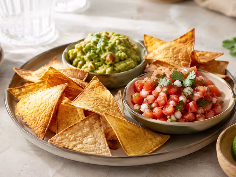 Air-fryer tortilla chips plated and ready to eat