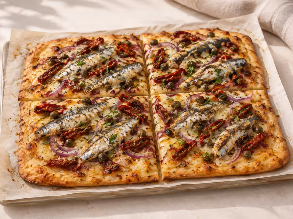 Sun-dried tomato and sardine flatbread ready to serve