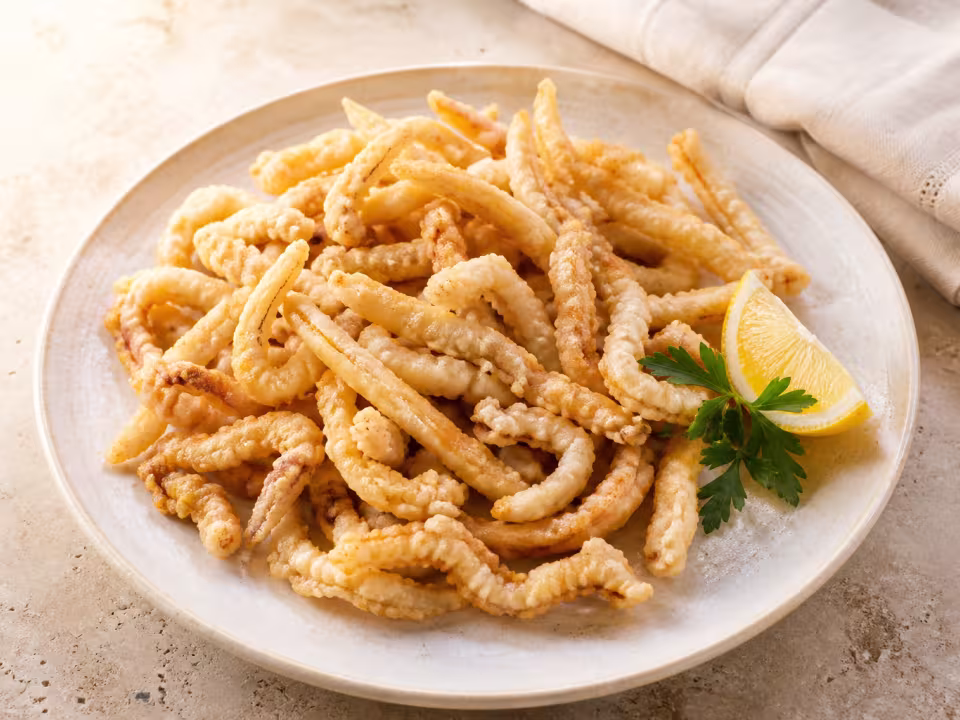Spanish-style battered squid served on a light table