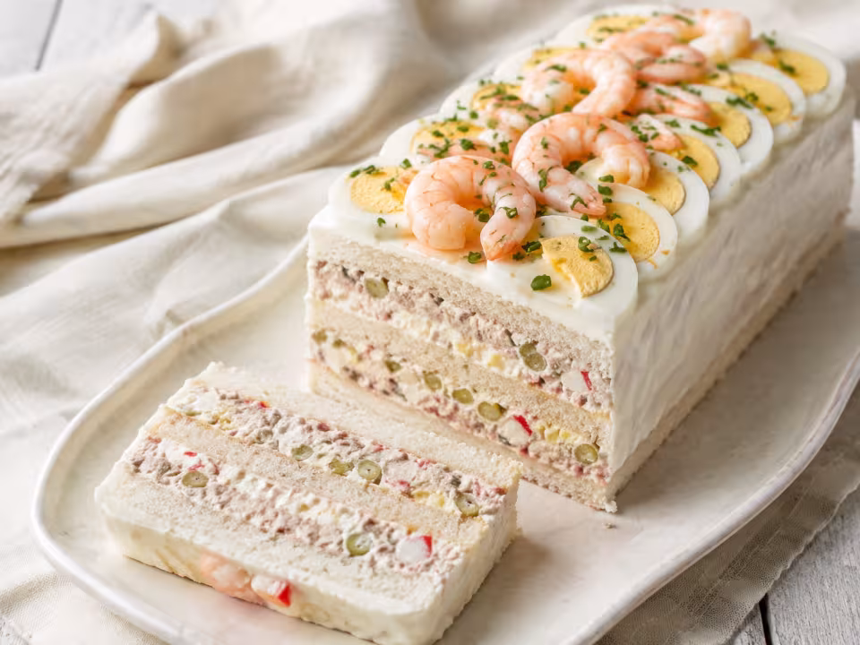 Chilled tuna, egg and prawn sandwich loaf served with a natural homemade finish