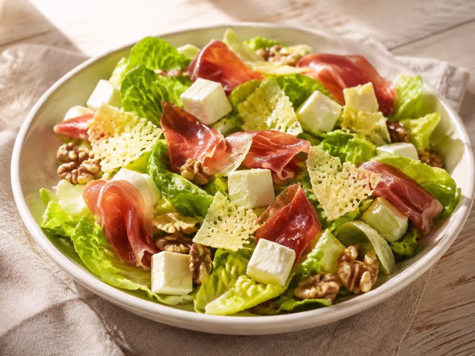 Serrano ham, cheese and walnut salad served with a natural homemade finish
