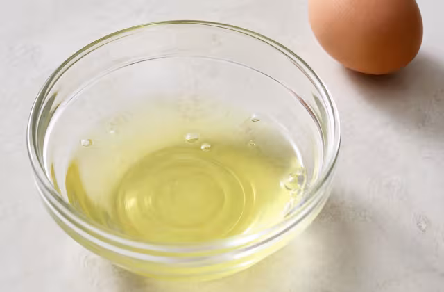 The clear part of an egg, rich in protein and able to trap air when whipped.