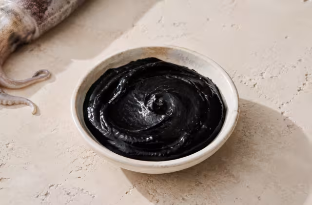Concentrated seafood ink adding dark colour and savoury depth.